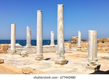 Roman old marbe column square in caesarea Archaeological site close to Herod the Great hippodrome