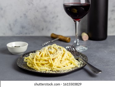 Roman pasta spaghetti with black pepper and cheese. Cacio e pepe. Recipes. Wine. Vegetarian food. National cuisine. - Powered by Shutterstock