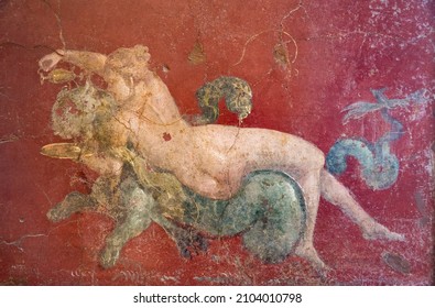 Roman Pompeian Fresco Representing Mythological Figures In Naples, Italy