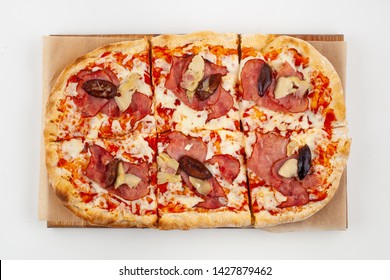 Roman Square Pizza With Cheese, Champignons, Plum And Pastrami, Baked In Coal Stove And Isolated On White Background