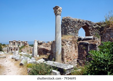 Roman Street In Pompeii With Chariot Grooves In The Stone And Stepping Stones For Pedestrians