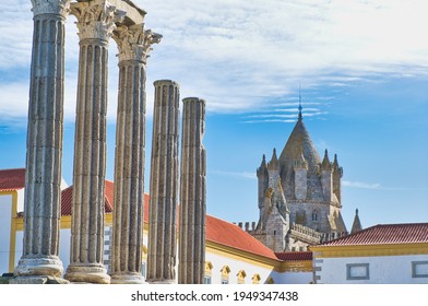 Roman Temple Of Évora And Cathedral In The Background