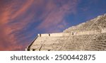 Roman Theatre in Amman, Jordan -- theatre was built the reign of Antonius Pius (138-161 CE), the large and steeply raked structure could seat about 6000 people. Against the sky with clouds 