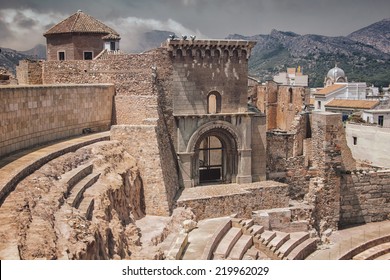 Roman Theatre In Cartagena, Spain With Mountains At The Background. It Has A Museum And Is Open For Tourists