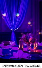 romance  dinner setup idea violet and warm tone decoration on the table for indian wedding 