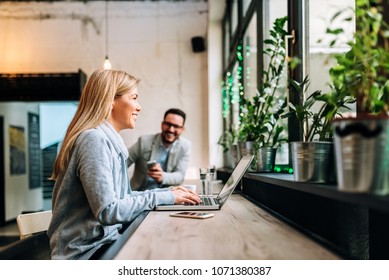 Romance Everywhere. Young Charming Woman Talking To Attractive Stranger At The Cafe.