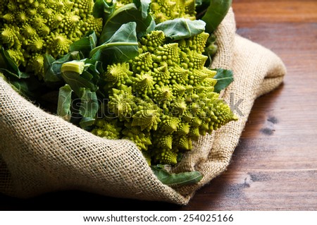 Romanesco broccoli cabbage on wood