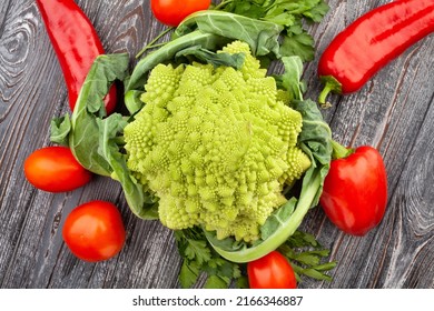 romanesco broccoli on wood background top view