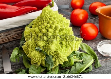 romanesco broccoli on wood background
