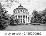 The Romanian Athenaeum, a concert hall in the center of Bucharest, Romania, home of the George Enescu Philharmonic in black and white