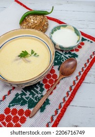 Romanian Dish Tripe Soup With Hot Peppers, Sour Cream And Bread