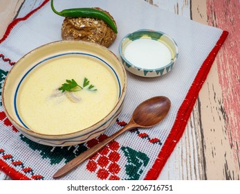 Romanian Dish Tripe Soup With Hot Peppers, Sour Cream And Bread