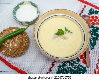 Romanian Dish Tripe Soup With Hot Peppers, Sour Cream And Bread