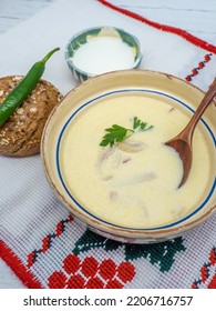 Romanian Dish Tripe Soup With Hot Peppers, Sour Cream And Bread