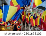 Romanian flags of different sizes,selective focus