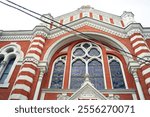 Romanian Historical Monument - the Brașov Synagogue (Burzenland, Transylvania). A close-up photo of the beautiful Secession-style decor on the main facade of the Beth Israel Synagogue in Romania.