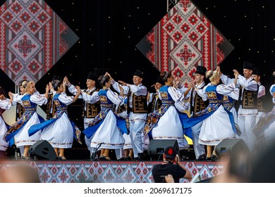 Romanian People In Folkloric Dress At The Folkloric Festival In Sibiu In Romania, August 07, 2021