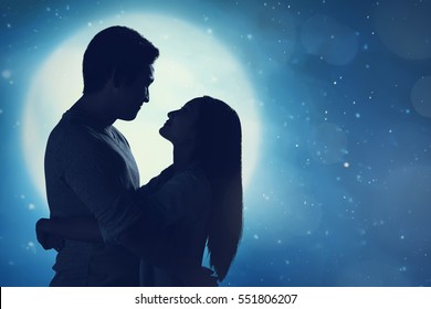 Romantic asian couple in love embracing each other on the moonlight - Powered by Shutterstock