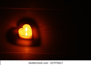 Romantic Atmosphere With Candle Lights On Dark Background