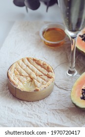 Romantic Authentic Home Indoor Picnic, Champagne Glass, Papaya, Camembert Cheese, Jamon And Nuts, Eucalyptus Branch