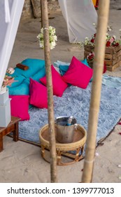 Romantic Beach Setting With Blue And Pink Cushion Pillows Rug Bamboo Structure Love Concept No People