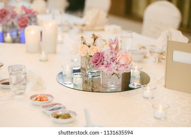 Romantic Bouquet Of Flower And Candles, Long Table Setting And Decoration For Wedding Dinner Or Celebration Party.