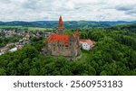 Romantic Bouzov Castle standing near Olomouc in the Czech Republic. A beautiful fairytale castle in the light of the setting sun.