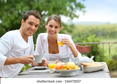 Romantic breakfast in hotel garden - Powered by Shutterstock