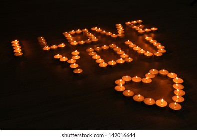 Romantic Candles On Dark Background