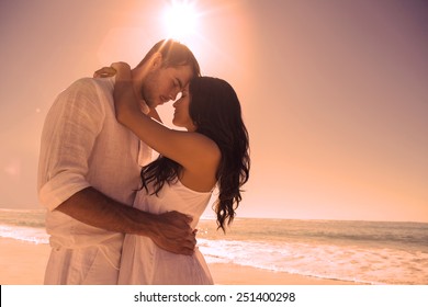 Romantic Couple Embracing At The Beach