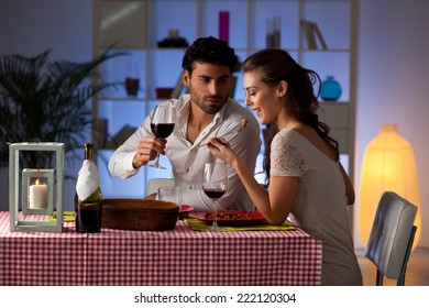 Romantic Couple Having Dinner At Home.