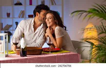 Romantic Couple Having Dinner At Home.