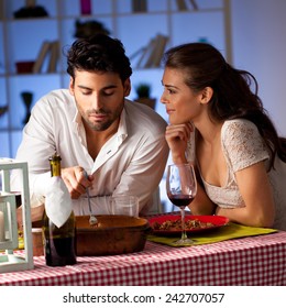 Romantic Couple Having Dinner At Home.