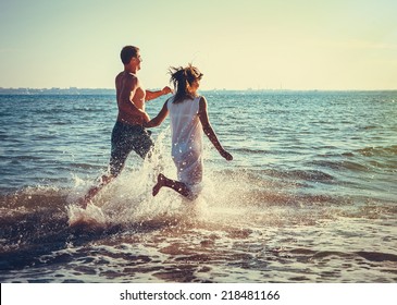 Romantic Couple Having Fun On The Beach 