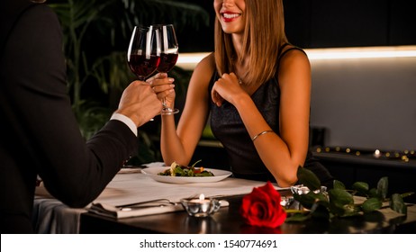 Romantic Couple Having Intimate Dinner For Two At Home Kitchen