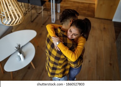 Romantic Couple In A Hug, Matching Clothes.