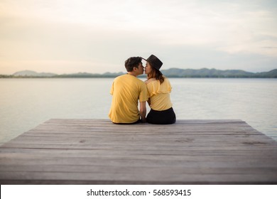 Romantic Couple Kissing On The Dock