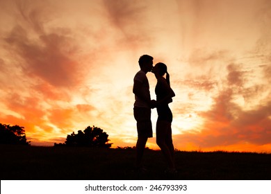 Romantic Couple Kissing Park Stock Photo (Edit Now) 246793393