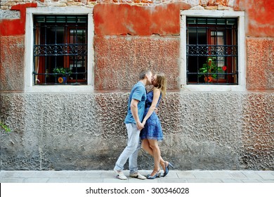 Romantic Couple Kissing In Venice, Italy