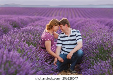 Romantic Couple In Love In Lavender Fields, Having Vacations In Provence, France.