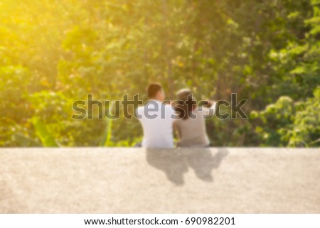 Romantic of couple love sitting ,take a selfie ,blur