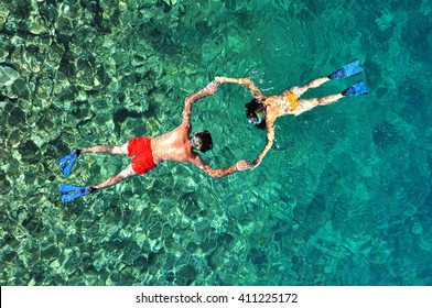 Romantic Couple Snorkeling In Thailand