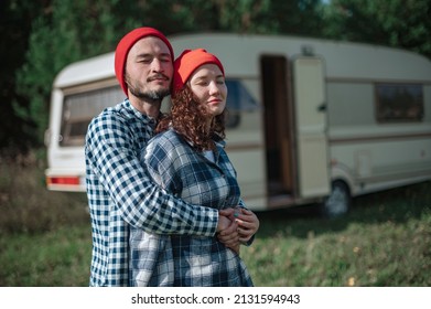 Romantic Couple Spending Time Together Near Trailer Home. 