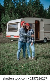 Romantic Couple Spending Time Together Near Trailer Home.