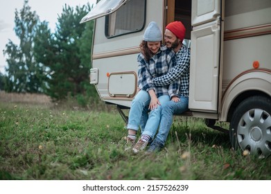 Romantic Couple Spending Time Together Near Trailer Home.