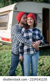 Romantic Couple Spending Time Together Near Trailer Home.