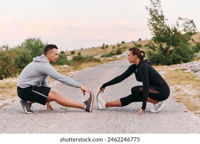 A Romantic Couple Stretching Down After a Run - Powered by Shutterstock