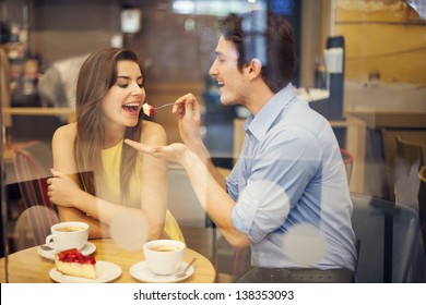 Romantic dating in cafe - Powered by Shutterstock