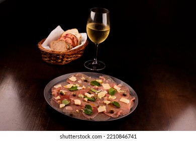 Romantic Dinner With Carpaccio Cold Meats Basket Of Artisan Breads Caper Mustard Dijon Glass Of White Wine