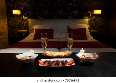 Romantic Dinner With Champagne In The Bedroom. Low Key